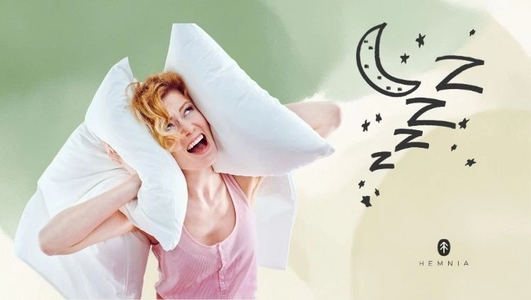 A woman holding pillows to her head, with symbols of sleep beside her; the Hemnia logo is at the bottom right
