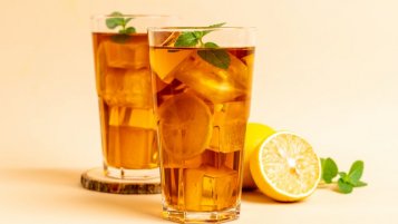 Homemade iced tea with herbs refreshes