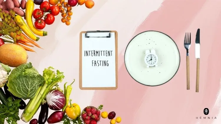 Intermittent fasting – plate, clock, and healthy foods as part of a balanced diet, Hemnia logo at bottom right